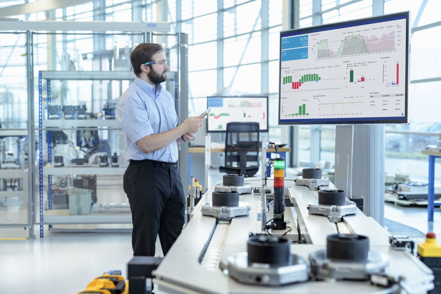 engineer-testing-a-robotic-production-simulator-in-2023-11-27-04-56-42-utc.jpg